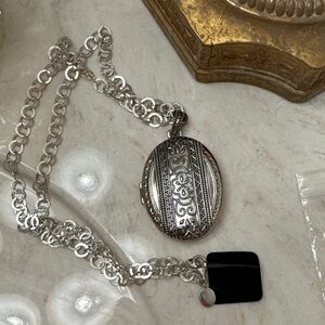 Intricate Silver Floral Locket Necklace